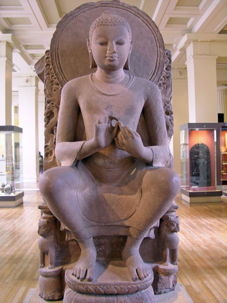 British Museum Top 20 13 Seated Buddha 13. Seated Buddha � Eastern India (possibly Sarnath), 5CAD, 1.18m high. This sandstone statue of Shakyamuni is notable for its posture, since it is more common to see him seated with legs crossed. Here he sits on a lion's throne with his feet on a double lotus. His hands are in the teaching mudra, delivering his first teaching in the Deer Park at Sarnath.
